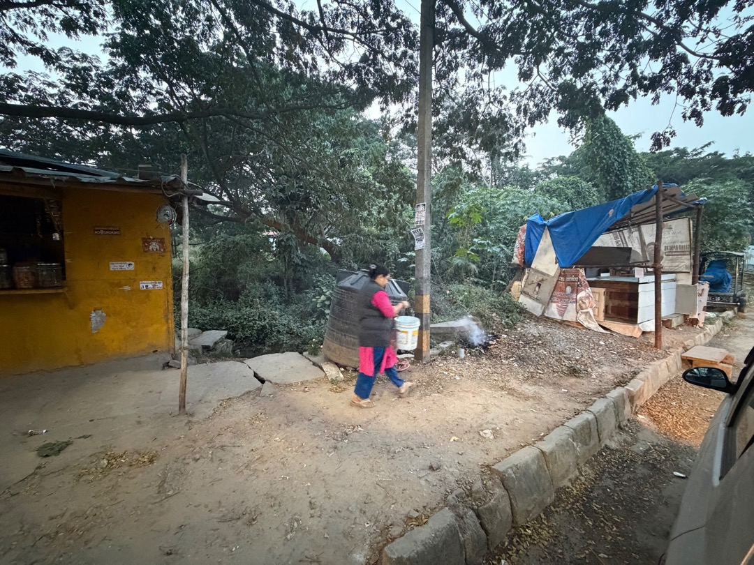 Community member extinguishing fire after request